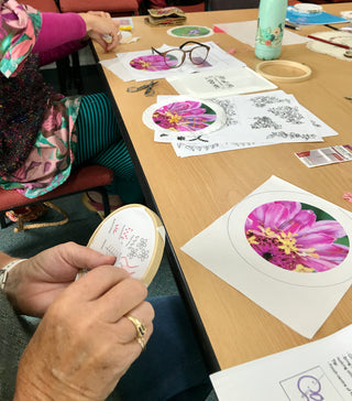 Students work on their embroidery pieces in their Embroidered Artwork: Transfer-Stitch Workshop.