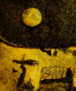 Felt bag detail with yellow and black.