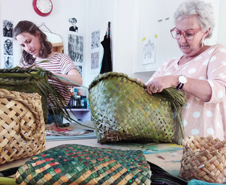 Students weaving their own NZ Flax (Harakeke) shopping baskets and bags.