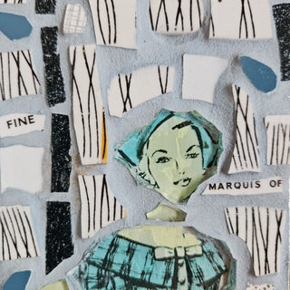 Felted artwork made from red and light blue felt.