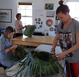 Students weaving their own NZ Flax (Harakeke) shopping baskets and bags.