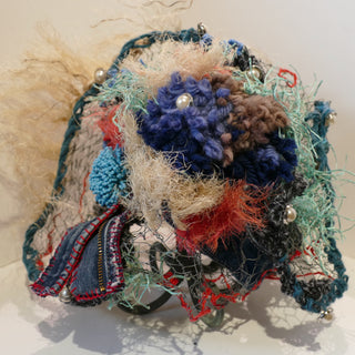 Another angle of The Tangle Within - sculpture made from reclaimed and recycled materials by local artists Maggy J.