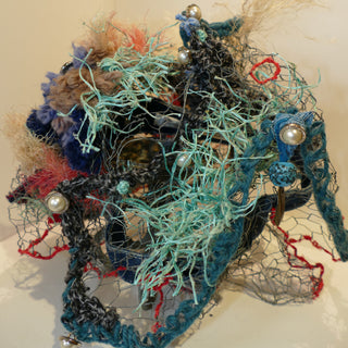 Another angle of The Tangle Within - sculpture made from reclaimed and recycled materials by local artists Maggy J.